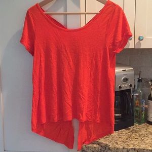 Orange lightweight open back detail top